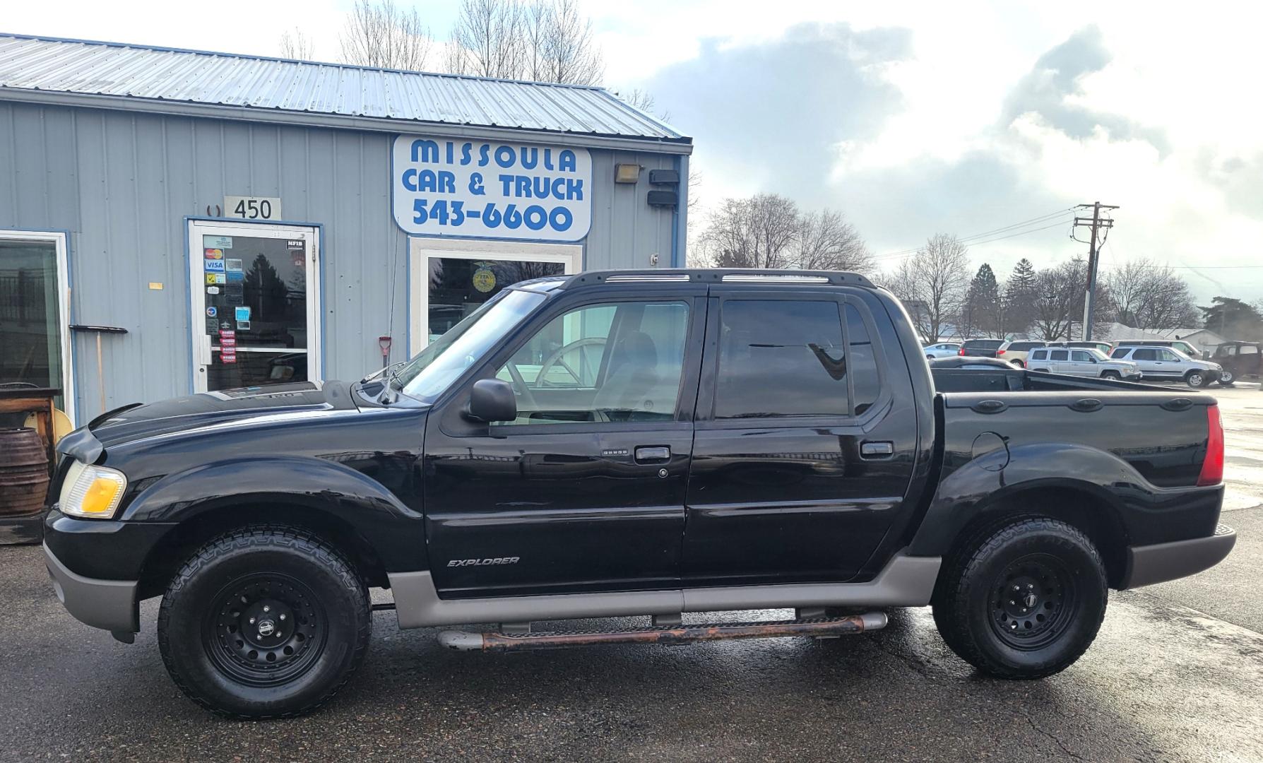 2001 Black /Black Ford Explorer Sport Trac Sport Trac (1FMZU77E41U) with an 4.0L V6 engine, Automatic transmission, located at 450 N Russell, Missoula, MT, 59801, (406) 543-6600, 46.874496, -114.017433 - Hard to find Truck / SUV. 4 Wheel Drive. Automatic Transmission. Nice Wheels and Tires. Power Windows and Locks. Power Back Window. AM FM CD. Air. Cruise. Tilt. Financing is not available on this vehicle. - Photo#0